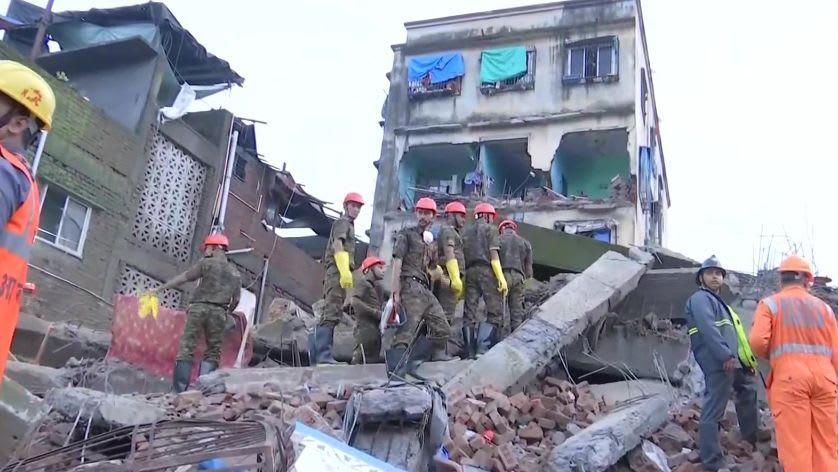 2 killed, many feared trapped as building collapses near Mumbai ...