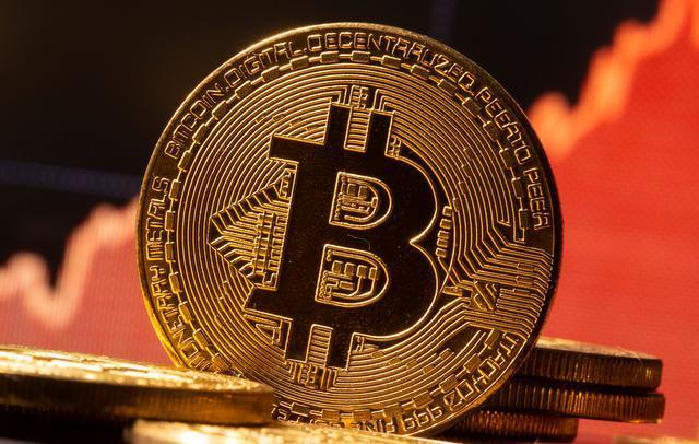 Bitcoin surges past $59,000 to hit a new record high ...