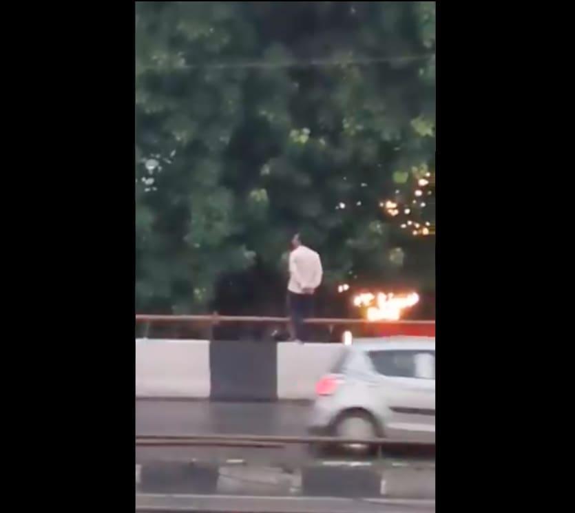 Delhi Police Stop Suicide Attempt Save 40 Year Old Man From Jumping Off Flyover