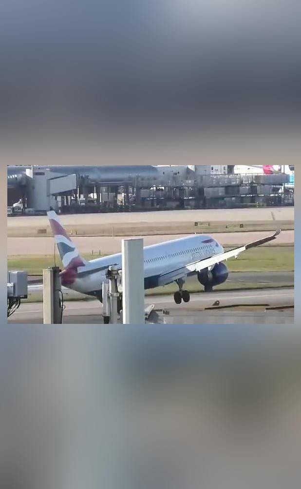 Plane almost flips over as landing aborted amid high winds in UK; video ...
