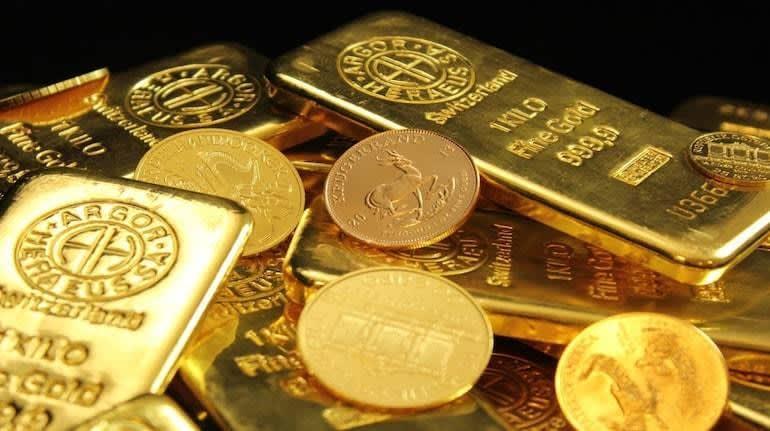 Gold prices fall after us fed officials hint at interest rate hike