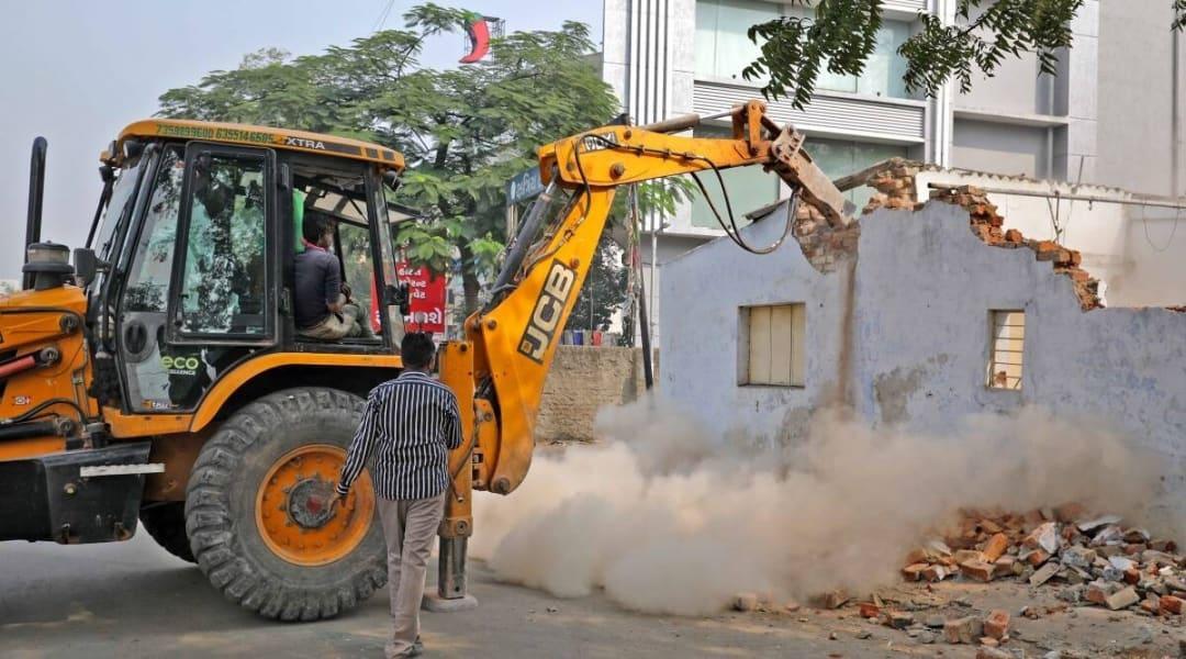 UP Police call bulldozer as in-laws refuse to let woman enter home UP Police call bulldozer as in-laws refuse to let woman enter home