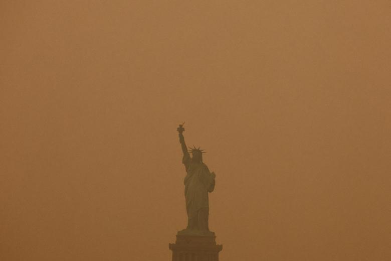Pic shows Statue of Liberty covered in haze due to Canada wildfire smoke