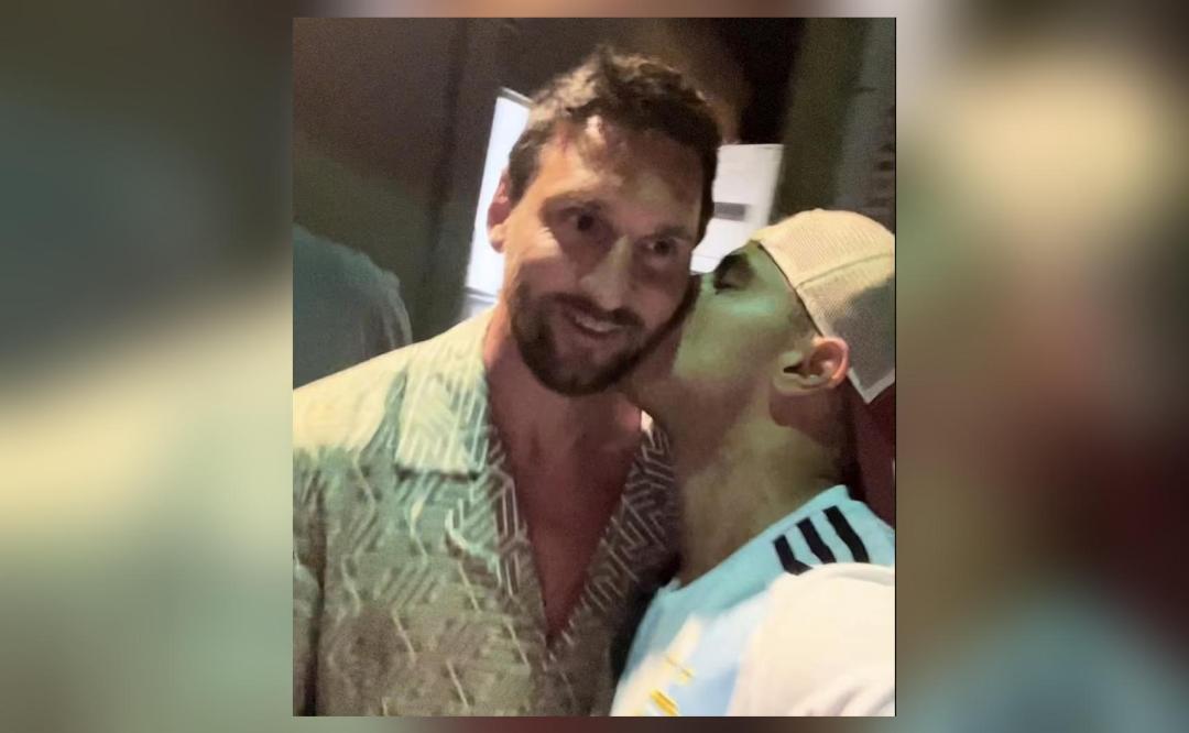 Lionel Messi gets kissed by fan while sneaking out of restaurant in