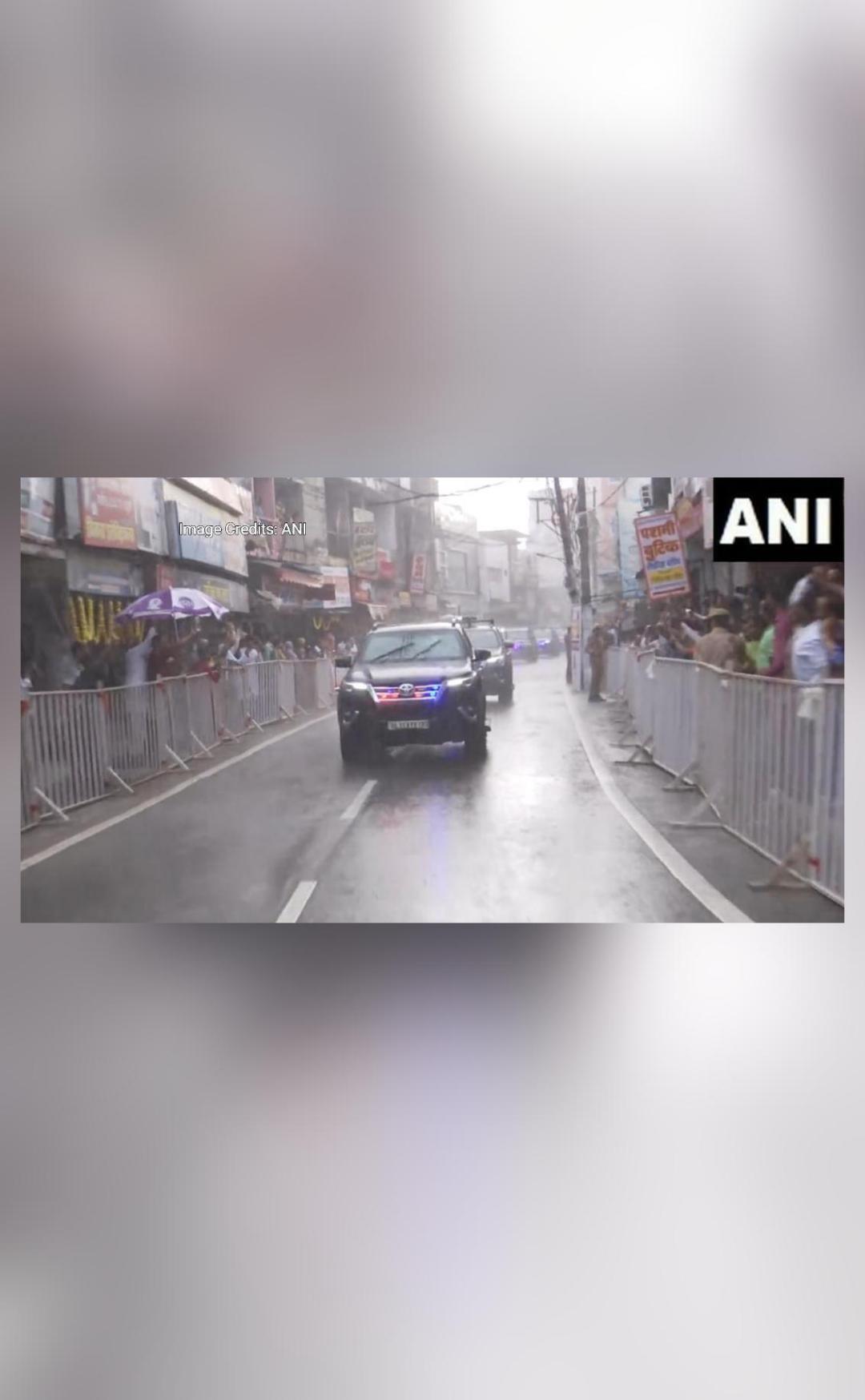 Video shows people gathering to greet PM Modi despite rain in UP