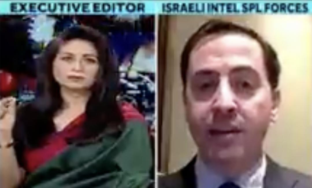 Israeli guest gets angry at TV news anchor for wearing green & red