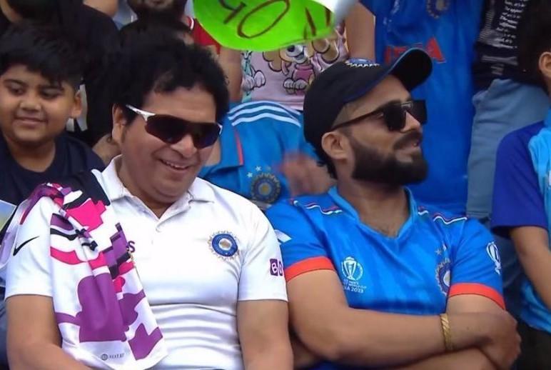 Pic showing Sachin and Kohli lookalikes watching Australia-Afghanistan match goes viral - Vimarsana News