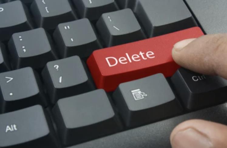How can deleting old emails and pictures help save water?