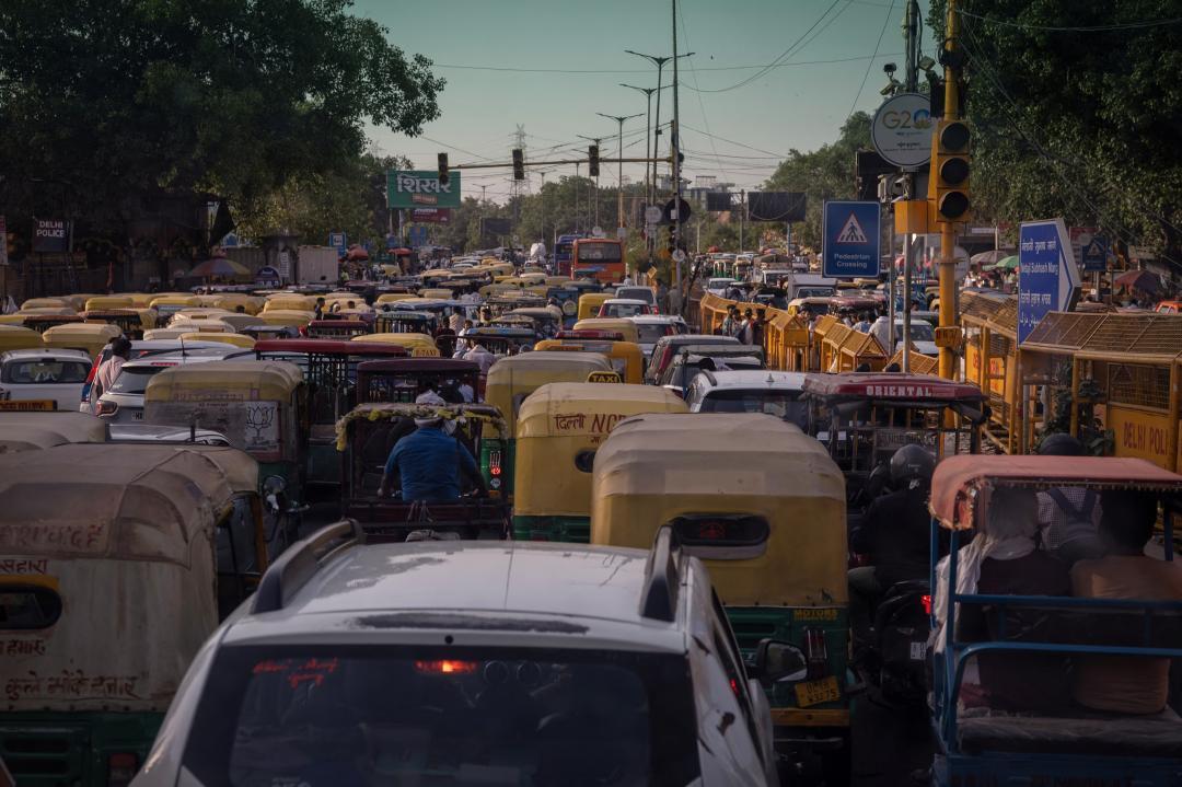 How will the new GST rates affect prices of cars, motorbikes and bicycles?