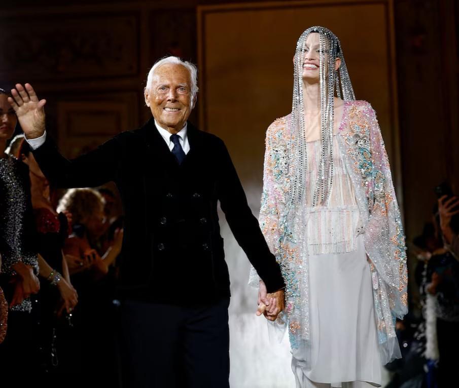 Who was Giorgio Armani, one of the richest designers in the world?
