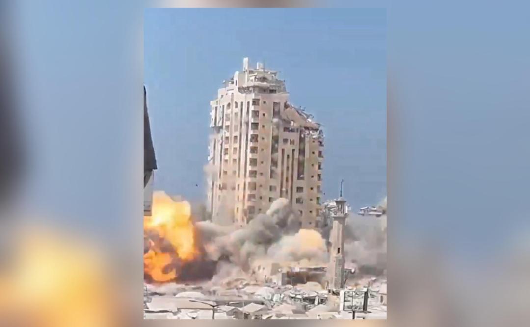 Israel bombs high-rise tower in Gaza, says opening 'gates of hell'