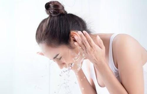 How can washing face with tap water be harmful?